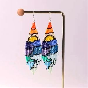 Seed been Sunrise boho drop earrings.